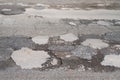 Holes and damaged road in small town of Germany Royalty Free Stock Photo