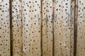 Holes in wood Board, wood Board background Royalty Free Stock Photo