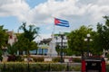 HOLGUIN, CUBA: Monument and flag of Cuba, which develops in the wind in the city center.