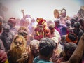 Holi celebration at cremation ground with pyre-ashes in holy Varanasi