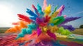 Holi color explosion in open field under blue sky Royalty Free Stock Photo
