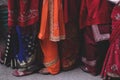 Women line waiting for take a place for offer food to the holy spirits during the Holi festival