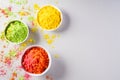 Holi festival celebration. Traditional Indian Holi colours powder decoration with paints. Top view of Organic Gulal colors in Royalty Free Stock Photo