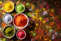 Holi festival celebration. Traditional Indian Holi colours powder decoration with paints. Top view of Organic Gulal colors in Royalty Free Stock Photo