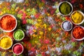 Holi festival celebration. Traditional Indian Holi colours powder decoration with paints. Top view of Organic Gulal colors in Royalty Free Stock Photo