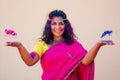 Holi Festival Of Colours. Portrait of happy indian girl in traditional hindu sari on holi color . india woman silver Royalty Free Stock Photo