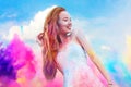 Holi Festival Of Colours. Portrait Of Happy Young Pretty Girl On Holi Color Festival. Girl With Colorful Long Pink And Blue Hair S