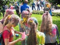 Holi festival in Russia. Gatchina. In the summer 2017. Young color girl and boy on Holi color festival in Saint-Petersburg.