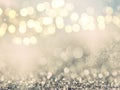 holiday abstract glitter background with blinking stars and falling snowflakes. Blurred bokeh of Christmas lights Royalty Free Stock Photo