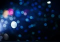 holiday abstract glitter background with blinking stars and falling snowflakes. Blurred bokeh of Christmas lights Royalty Free Stock Photo