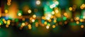 Holiday Abstract shiny green and gold bokeh and glitter for invitation. green and golden bokeh background Royalty Free Stock Photo