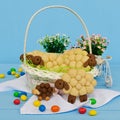 Holiday almond biscuits lamb in a basket. Square Royalty Free Stock Photo