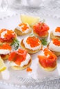 Holiday appetizer with caviar and salmon.