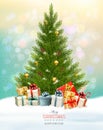 Holiday background with a Christmas tree and presents. Royalty Free Stock Photo