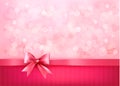 Holiday background with gift pink bow and ribbon