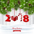 Holiday background with tree branches and hanging numbers and ornaments