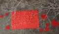 Holiday background for Valentine`s Day on a gray cement background with white painted branches and a sheet of paper for text