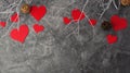 Holiday background for Valentine`s Day on a gray cement background with white painted branches and a sheet of paper for text