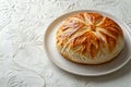 holiday baking, traditional orthodox easter bread displayed on a white plate, against a simple white backdrop with Royalty Free Stock Photo
