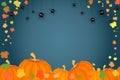 Holiday banner with pumpkins, spiders and autumn leaves isolated on dark background. Royalty Free Stock Photo