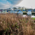 Boats moored in a Norfolk Broads boat yard