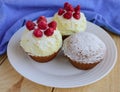 Holiday cakes (muffins) with raspberries