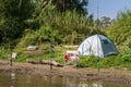 The holiday camp and fishing rods, Jordan River, Israel Royalty Free Stock Photo