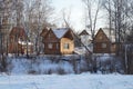 Wooden houses, among the birch forest. Royalty Free Stock Photo