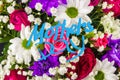 Holiday card - beautiful gift bouquet of various colorful decorative summer flowers, holiday greetings, handwritten inscription
