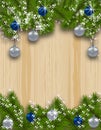 Holiday card. Green fir branches with silver and blue balls in the wood background. Up and down. Christmas decorations Royalty Free Stock Photo