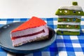 Holiday Cheesecake on a checkered tablecloth Royalty Free Stock Photo