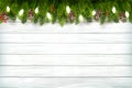 Holiday Christmas background with branch of tree and garland on Royalty Free Stock Photo