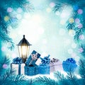 Holiday Christmas background with a gift boxes and lamp. Royalty Free Stock Photo