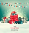 Holiday Christmas background with a sack full of gift boxes Royalty Free Stock Photo