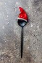 Holiday Christmas food background concept. Christmas menu concept. Cutlery spoon with Christmas decoration, stone