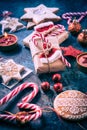 Holiday Christmas Gifts with Boxes, Candle and gingerbread cookies Royalty Free Stock Photo