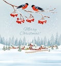 Holiday Christmas and Happy New Year background with a winter landscape and village and red bullfinch. Royalty Free Stock Photo