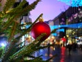 Holiday city light  Christmas tree decorated red balls and illumination on street ,people walking travel to Tallinn  Europe, Night Royalty Free Stock Photo