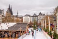 Holiday cityscape - view of the Christmas city skating rink on background the Cologne Cathedral