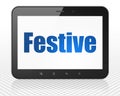 Holiday concept: Tablet Pc Computer with Festive on display