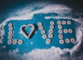 Holiday concept for Valentine`s day. Letters from round sweet candies