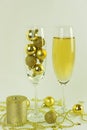 Holiday congratulations gift new year  champagne glass christmas decorations golden shiny balls isolate white background Royalty Free Stock Photo