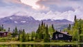 Holiday cottages on the lake in the mountains in Norway, Scandinavia, Gaustatoppen Royalty Free Stock Photo