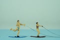 a holiday couple waterskiing, miniature figures scene