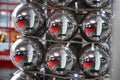 Minimal style Christmas decor of big mirror silver Christmas ornaments closeup. Reflection in many shiny glass balls. Royalty Free Stock Photo