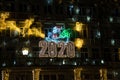 Varna, Bulgaria - December 7, 2019 - Colorful Christmas decorations and lights on courthouse building by night, New Year 2020