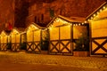 Holiday Decorated and illuminated street at night in Gdansk Poland. Beautiful Christmas fair in the old town at night Royalty Free Stock Photo