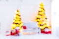 Holiday decorated room with Christmas tree out of focus shot for photo background