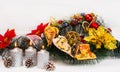 Holiday decoration candles and a handmade wreath Royalty Free Stock Photo