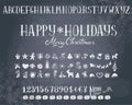 Holiday decorations and alphabet on a blackboard. Royalty Free Stock Photo